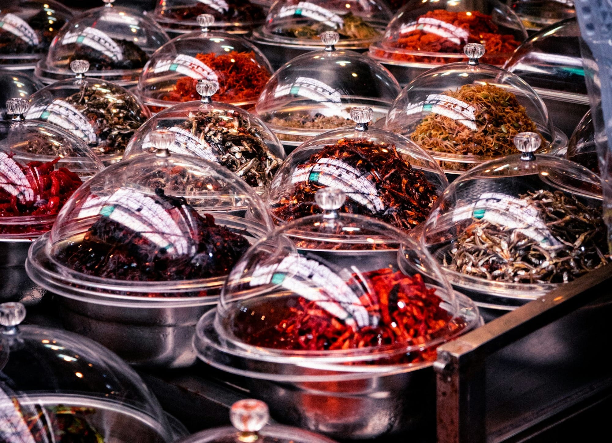 a bunch of bowls of food on a table